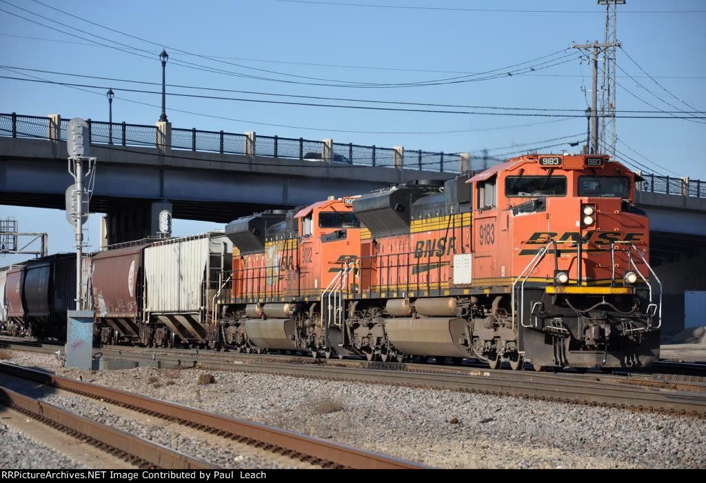 Grain train rolls east